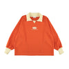 FOOTBALL POLO PULLOVERのオレンジ色でクリーム色の襟付きプルオーバー，胸にロゴ刺繍付き。