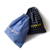 GIFT BAGのストライプとチェック柄のコットン巾着バッグ2つ、TUCKSHOPロゴ入り