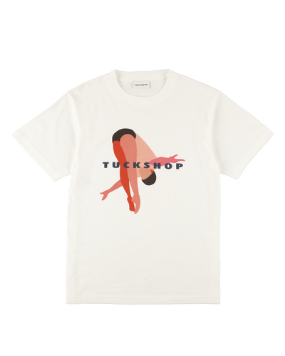White cotton t-shirt with a graphic print featuring a minimalist figure and the word 'TUCKSHOP'.