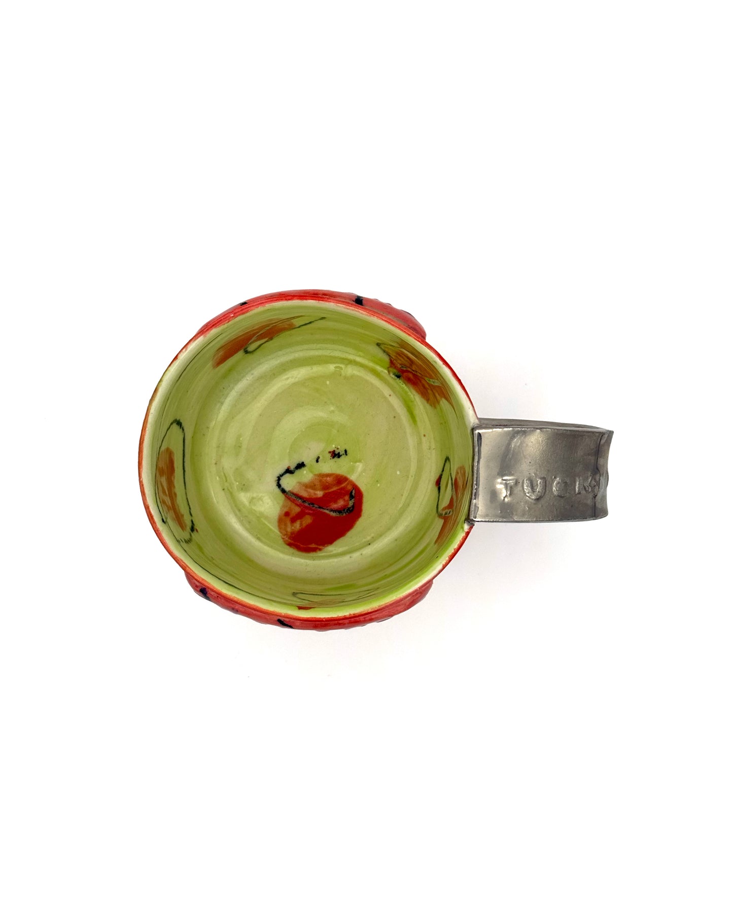 Top view of a unique PLATINUM MUG featuring colorful hand-painted design and a stylish embossed handle.