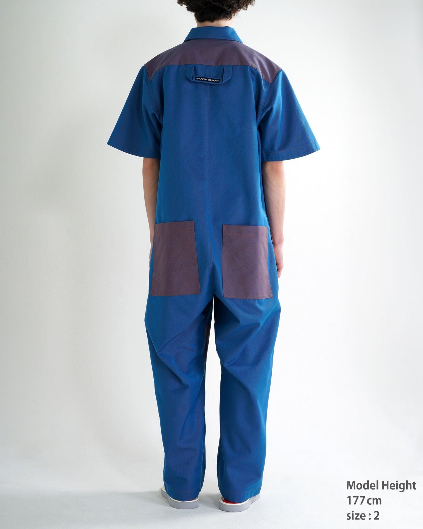 PANELED JUMPSUIT - TUCKSHOP