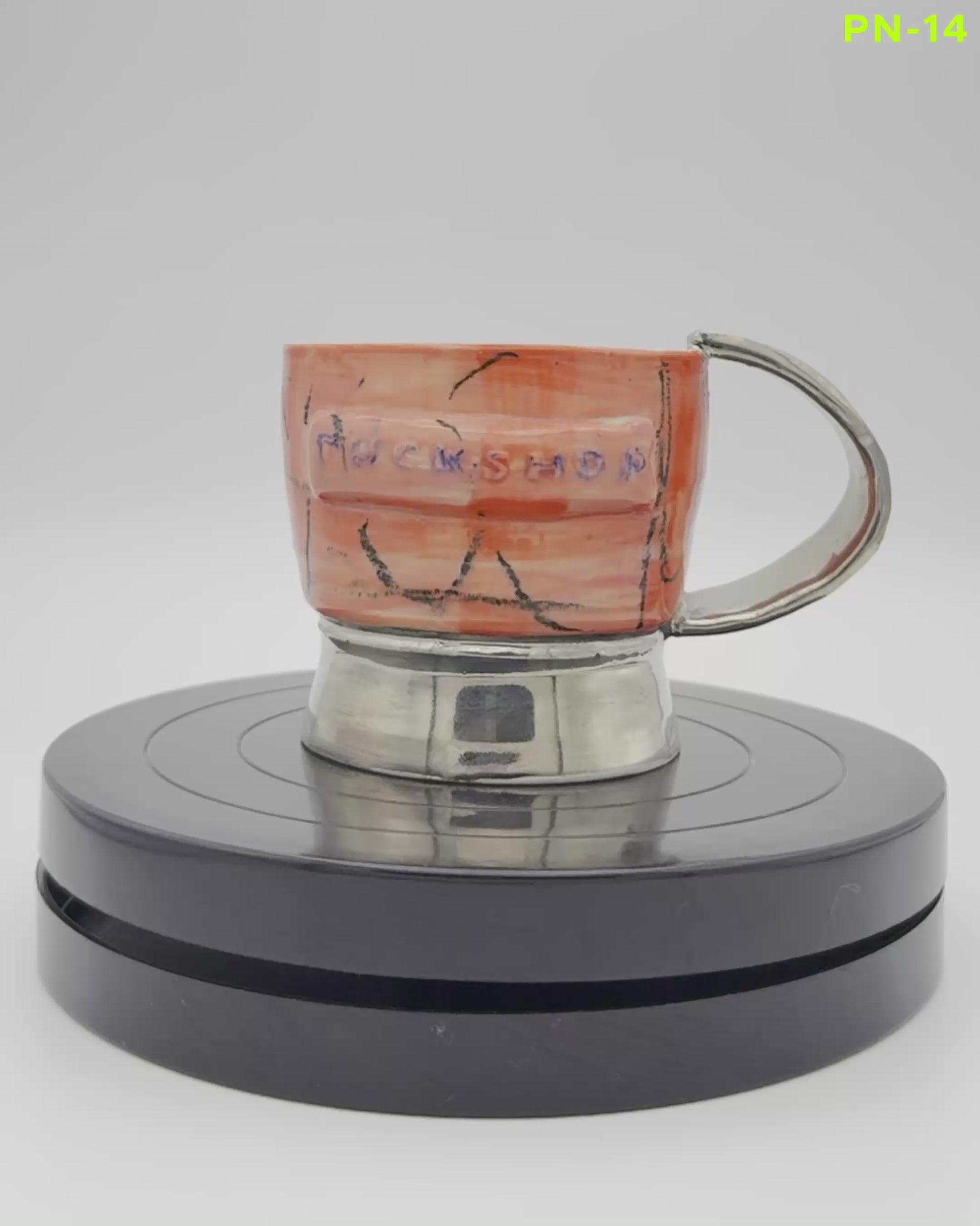 Unique PLATINUM MUG by artist Eri Azuma, featuring a textured design and embossed logo, showcasing a vibrant, artistic style.
