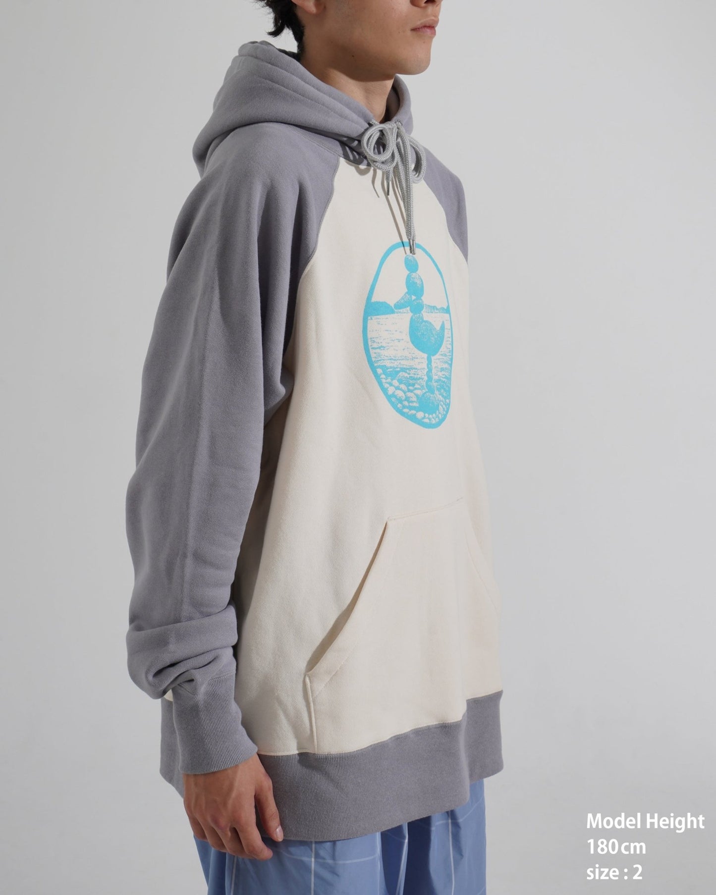 PRINTED RAGLAN HOODIE - TUCKSHOP